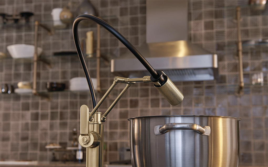 gold on silver metal sink